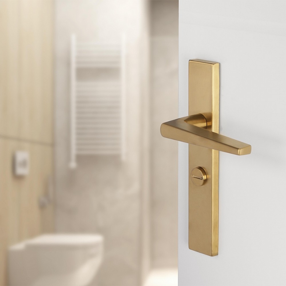 Differnz Rotterdam deurkruk vierkant schild - WC 63 mm goud